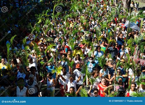 Crowds Of Catholic Worshipers Wave Palm Branches During The Palm Sunday