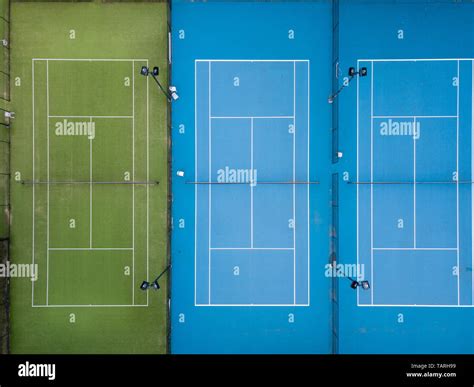 Aerial Overhead Shot Of Three Tennis Courts Side By Side No Players