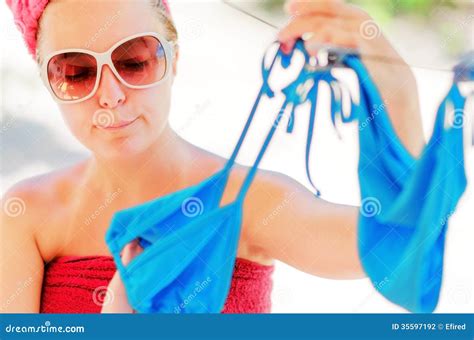 Woman Dries Blue Bikini On Clothesline Stock Photo Image Of Person Clothesline