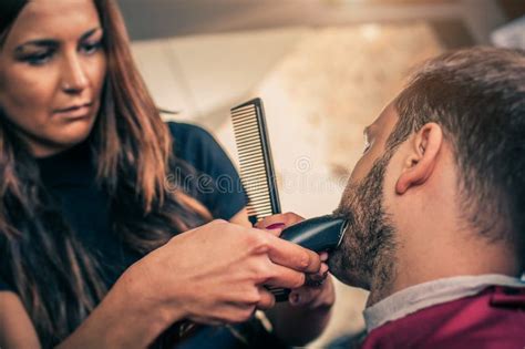 Barber Beard Cut A Client S Beard With Trimmer Stock Image Image Of