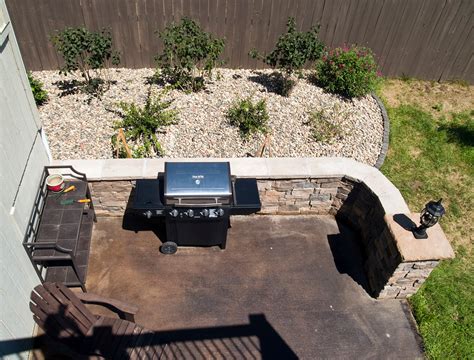 Brinkman Cedar Deck In Kc With Stamped Concrete Patio And Fire Pit