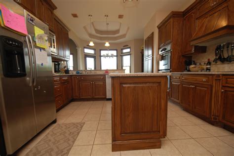 Dark Walnut Stained Cabinets Traditional Kitchen Kansas City By