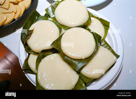 Banh Giay - Glutinous rice cake wrapped by banana leaves traditional ...