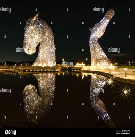 The Kelpies Illuminated At Night Stock Photo Alamy