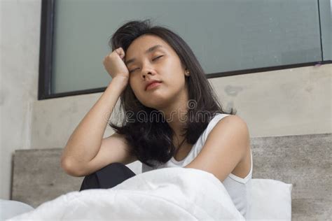 Asian Young Beautiful Women Look Sad Disappointed And Lonely At Home