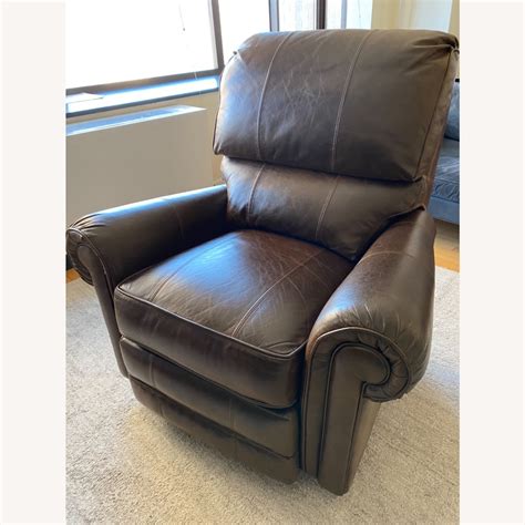 Bassett John Elway Dark Brown Leather Swivel Rocker Recliner - AptDeco