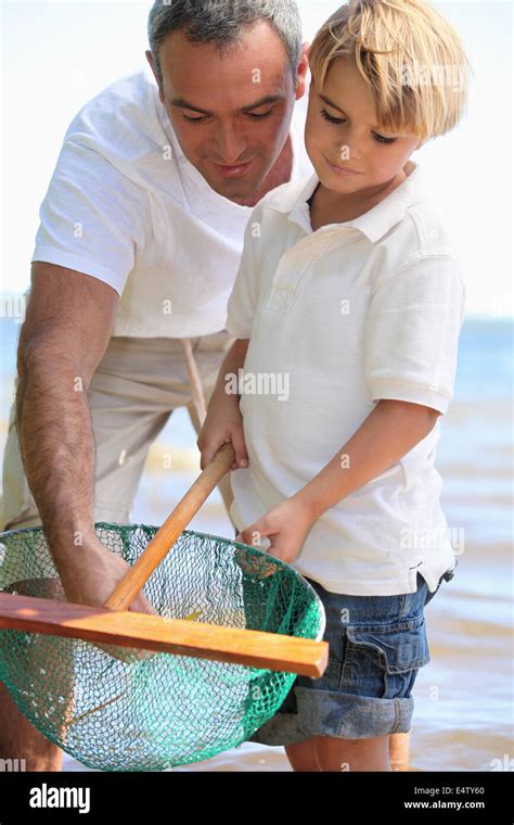 Father And Son Fishing Stock Photo Alamy