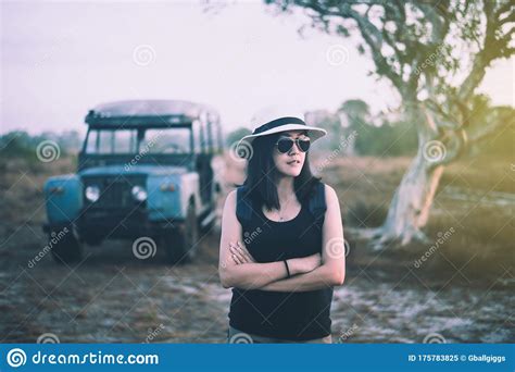 Hipster Traveller Asian Woman Standing And Looking Something At Outdoor