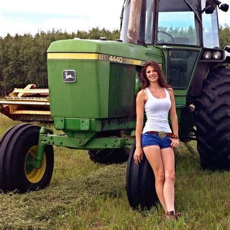 Female Farmer On Tractor