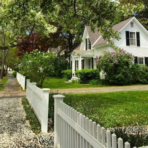 Dream House Exterior with Charming White Picket Fence