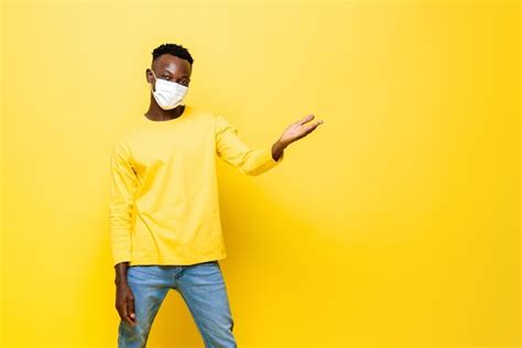 Premium Photo Portrait Of Young African Man Wearing Face Mask Protecting From Corovavirus With