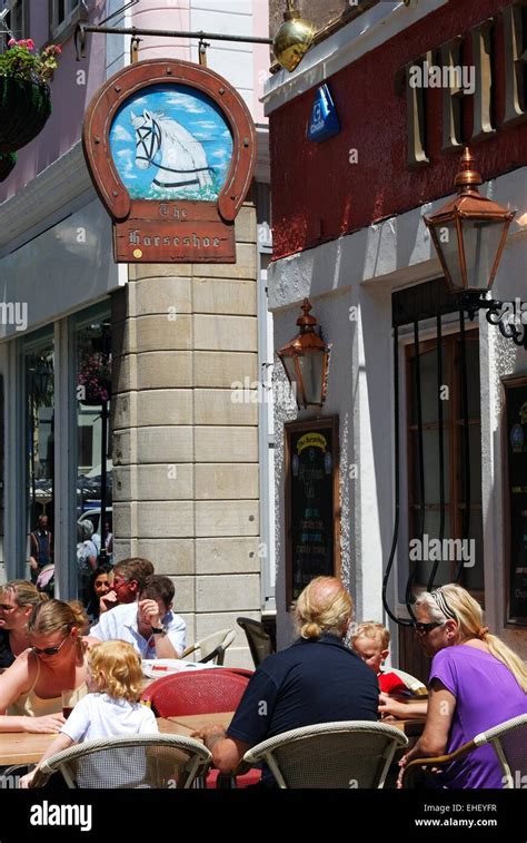 Tourists Relaxing At The Horseshoe Pub Along Main Street Gibraltar