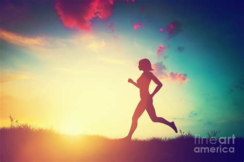 Silhouette of woman running at sunset Photograph by Michal Bednarek