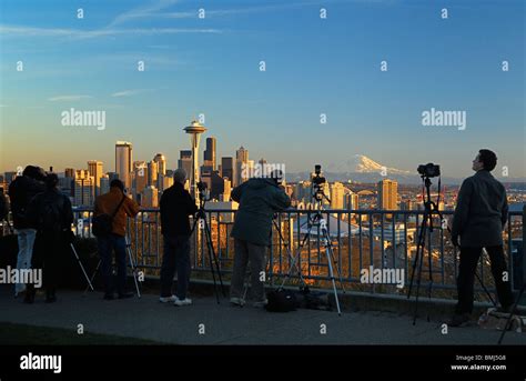 Photographers At Kerry Park Taking Photos Of The City Skyline At Sunset