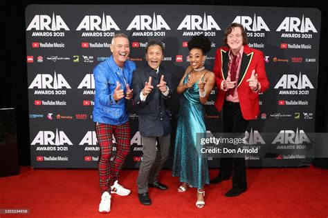 Tsehay Hawkins poses alongside other members of The Wiggles attends ...