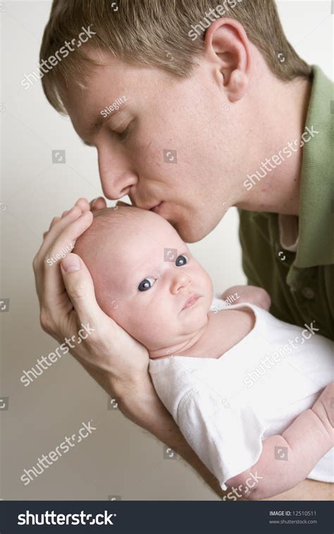 New Dad Kisses His Baby Stock Photo 12510511 : Shutterstock