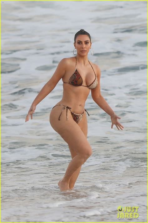 Kim Kardashian Flaunts Her Curves In A Bikini See The Beach Photos