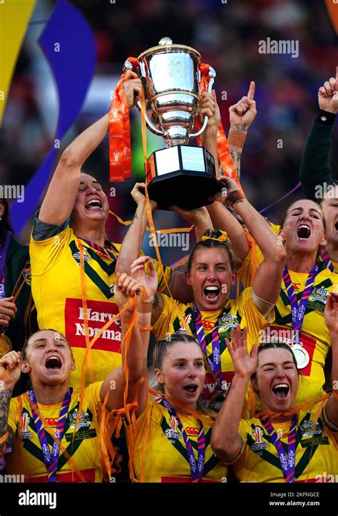 Australias Samantha Bremner Centre Lifts The Trophy Following The