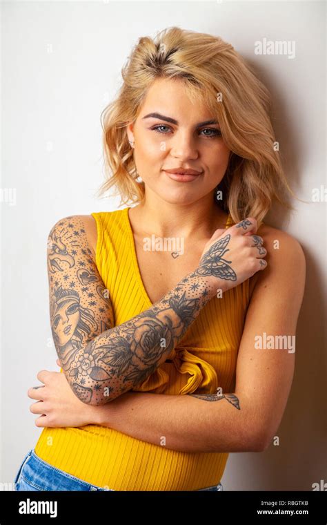 Portrait Of Beautiful Woman With Tattoos Stock Photo Alamy