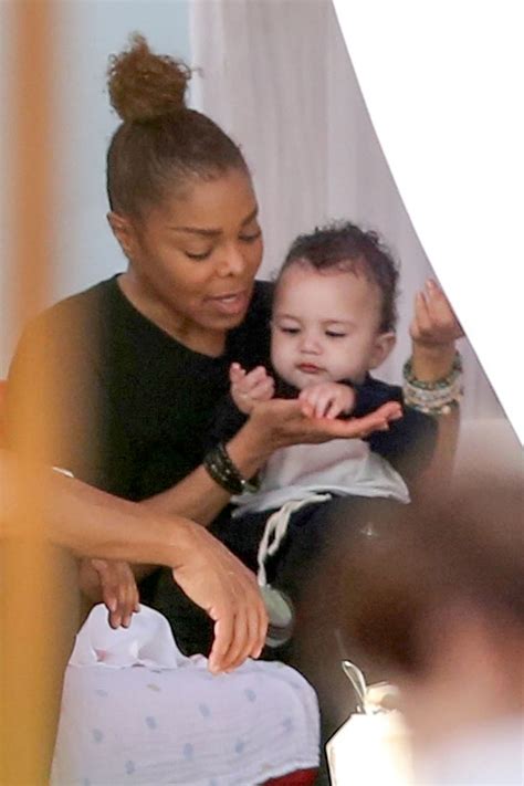 Janet Jackson feeds baby son Eissa in Miami Beach, Florida | Sandra Rose