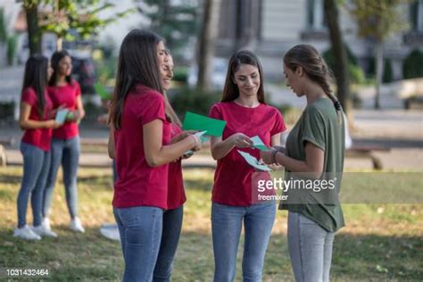 Handing Out Flyers Outside Photos and Premium High Res Pictures - Getty ...