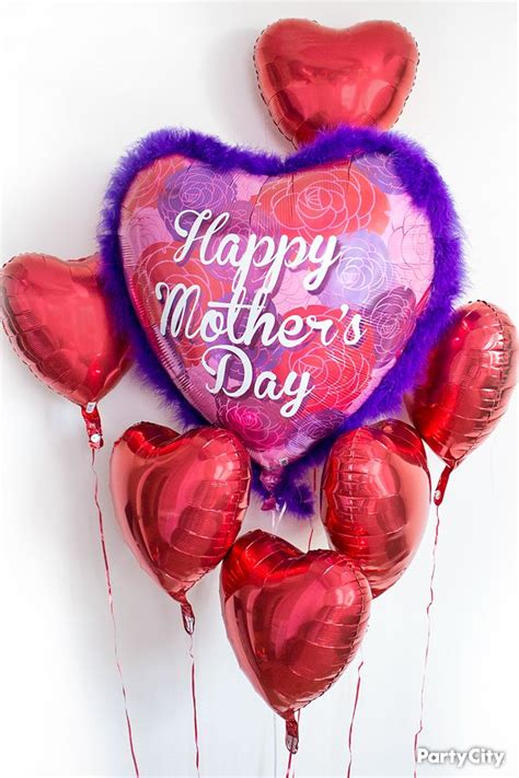 Heart Shaped Balloons With The Words Happy Mothers Day Written On Them