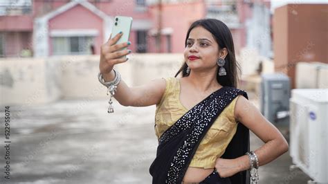 Beautiful Indian Girl Taking Selfie On Her Mobile Phone Outdoor