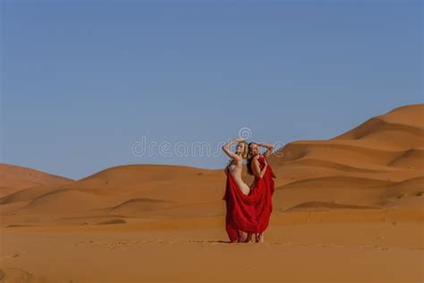 A Beautiful Model Poses Nude In The Sand Dunes In The Great Sahara