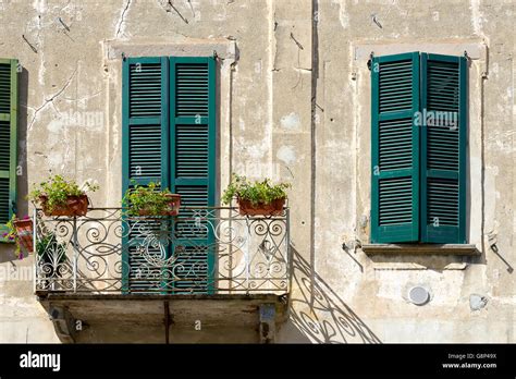 Shuttered Windows On A Building In Brivio Lombardy Italy Stock Photo