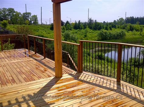 Basement Walkout Interlock With Deck And Pergola Toronto Landscaping Design And Interlock