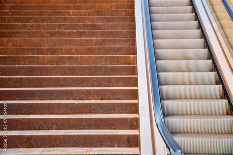 Stairs vs escalator Stock Photo | Adobe Stock