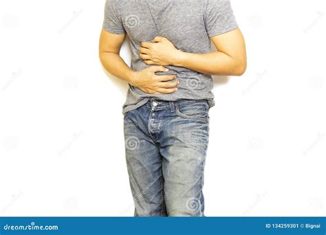 Man With Stomach Pain Hand Holding His Aching Belly Isolated Stock