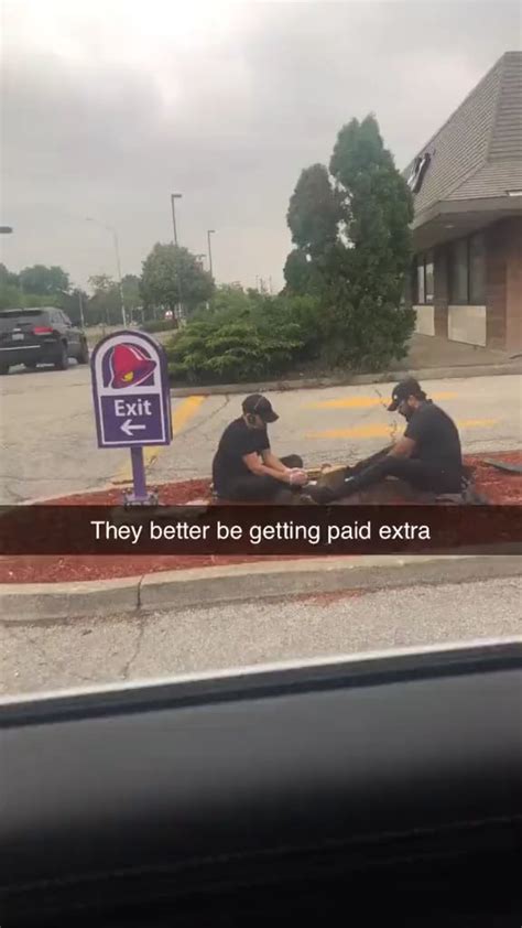 A Viral Tiktok Shows Two Taco Bell Workers Trying To Take Out A Stump