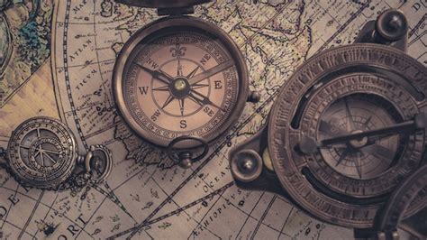 Premium Photo Old Nautical Maritime Compass On World Map