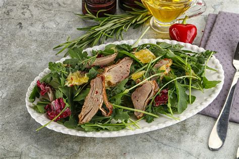 Salad with roasted duck and orange 35331763 Stock Photo at Vecteezy