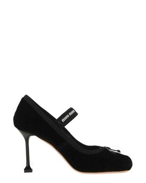 Miu Miu Bow Embellished Logo Detailed Pumps In Black Lyst