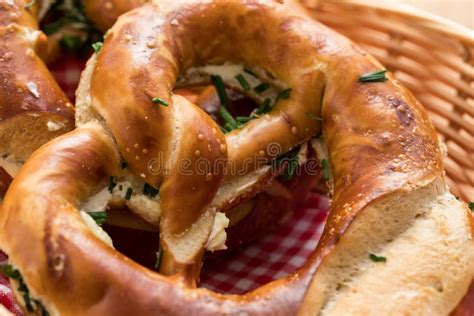 German Brezel Pretzel with Chives and Butter Stock Photo - Image of ...