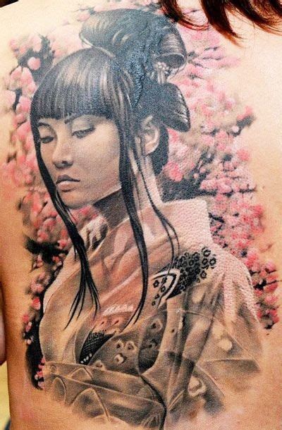 Realistic Photo Like Colored Sad Asian Geisha Tattoo On Back