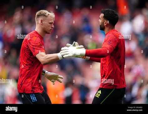 Arsenal Goalkeepers Aaron Ramsdale Left And David Raya Prior To The