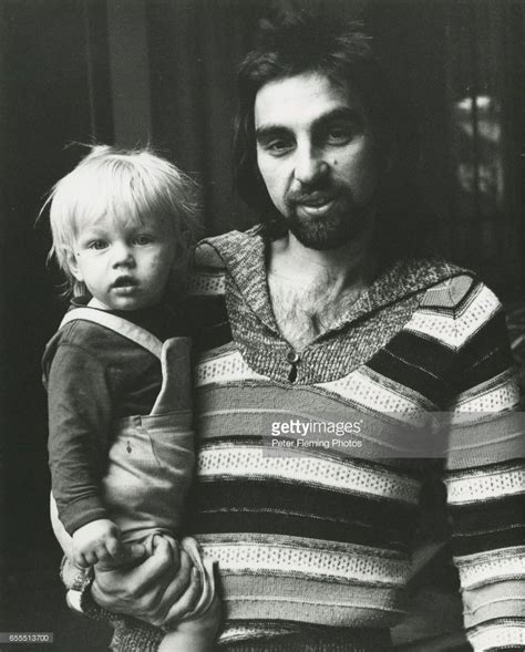 Leonardo Dicaprio Being Held By His Father George Dicaprio Outside