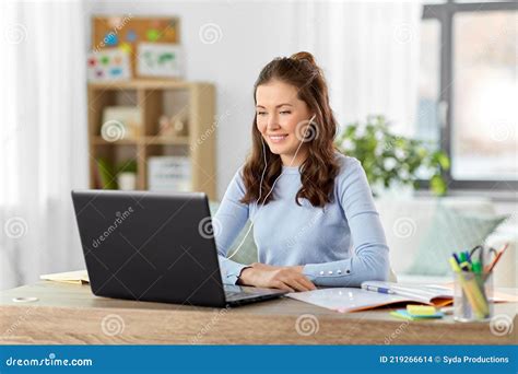 Teacher With Laptop Having Online Class At Home Stock Photo Image Of