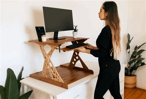 Improving Workplace Ergonomics: The Benefits of Using a Standing Desk ...