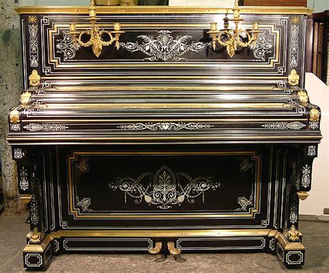 Debain Et Cie Upright Piano With An Ebonised Case Intricately Inlaid