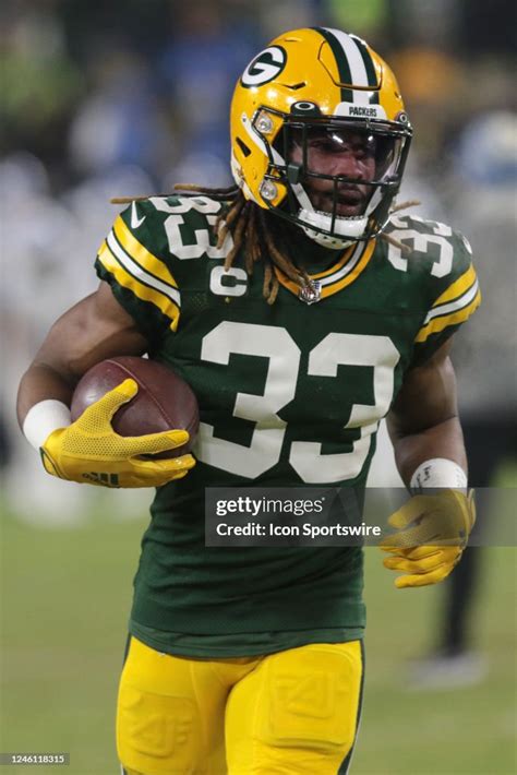 Green Bay Packers Running Back Aaron Jones Runs With The Ball During