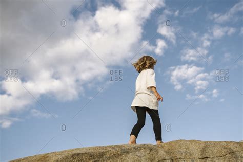 Girl Walking Off Cliff