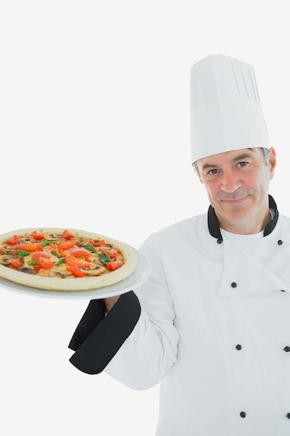 Premium Photo Happy Chef Holding Pizza