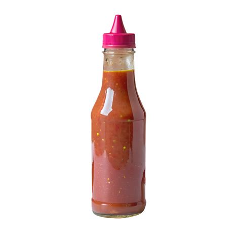 A Clear Glass Bottle Filled With Red Hot Chili Sauce Topped With A Pink Nozzle Cap Isolated On