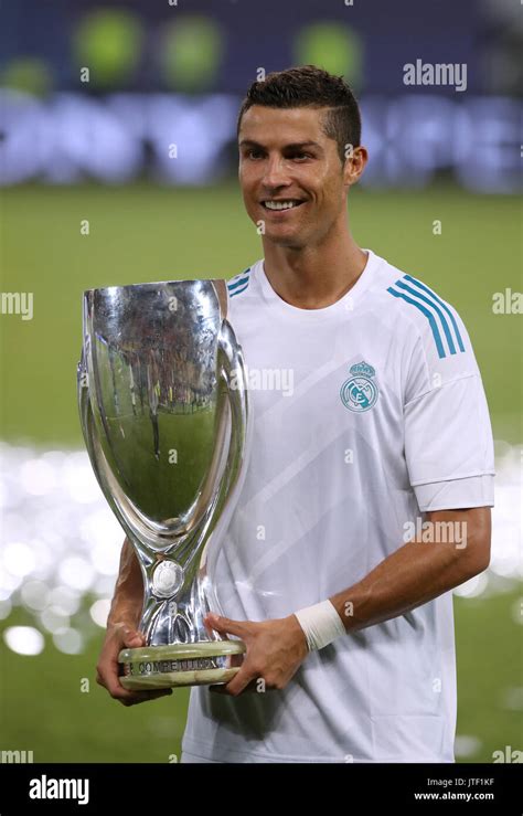 Real Madrid's Cristiano Ronaldo celebrates with the UEFA Super Cup ...