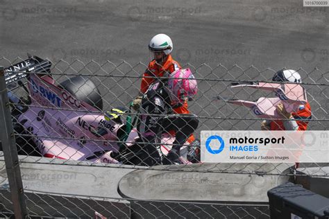 The Crashed Car Of Esteban Ocon FRA Force India VJM10 Is Recovered In