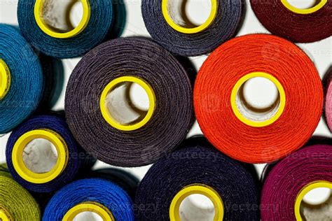 Set Of Multi Colored Spools Of Thread For Sewing Stock Photo